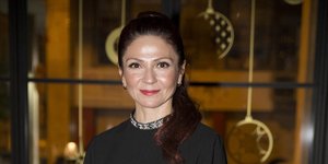 Η Ταμίλα Κουλίεβα με μαύρη μπλούζα και τζιν