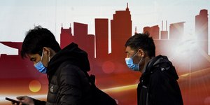 Κινέζοι με μάσκες