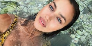 γυναίκα με μακιγιάζ στο νερό