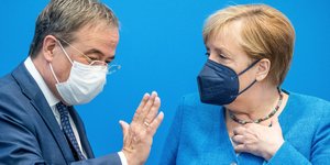 Η Άνγκελα Μέρκελ και ο υποψήφιος των Συντηρητικών που φιλοδοξεί να την αντικαταστήσει στην καγκελαρία, Άρμιν Λάσετ