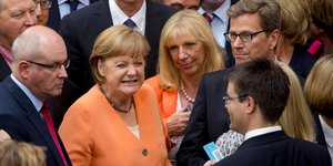 Η Άνγκελα Μέρκελ κάνει γκριμάτσα