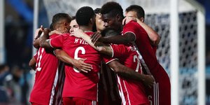 Πανηγυρίζουν οι παίκτες του Ολυμπιακού