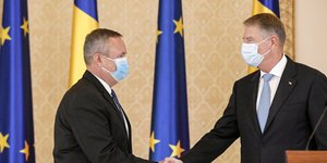 Νικολάε Τσιούκα, Κλάους Γιοχάνις