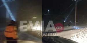 Εναερίτες του ΔΕΔΔΗΕ προσπαθούν μέσα στη χιονοθύελλα να επαναφέρουν το ρεύμα στην Αγία Αννα