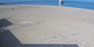 H στιγμή της έκρηξης (πάνω δεξιά) στην παραλία της Οδησσού 