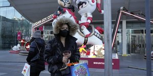 Κινέζα με μάσκα