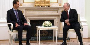 Ο Μπασάρ αλ-Άσαντ και ο Βλαντιμίρ Πούτιν κατά τη συνάντησή τους στη Μόσχα/ AP Photos