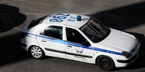 Περιπολικό στον δρόμο, από ψηλά