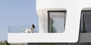 House Symbiosis: Μια βίλα που κρύβει δύο αυτόνομα σπίτια στη Φιλοθέη -Λευκά, με αρχιτεκτονική που παραπέμπει σε υπερσκάφος
