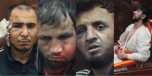 Με εμφανή σημάδια βασανιστηρίων εμφανίστηκαν στο δικαστήριο οι τέσσερις ύποπτοι για το μακελειό στη Μόσχα