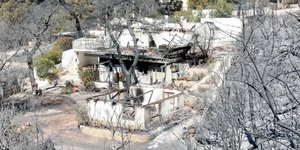 Inspection Teams Assess Fire Damage in Attica