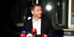 ανδρουλακης χαμογελο 