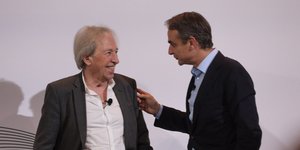 Πασκάλ Μπρικνέρ και Κυριάκος Μητσοτάκης στο ντιμπέιτ που διοργάνωσε το iefimerida