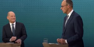 Ο Σοσιαλδημοκράτης καγκελάριος της Γερμανίας Όλαφ Σολτς και ο Χριστιανοδημοκράτης υποψήφιος Φρίντριχ Μερτς