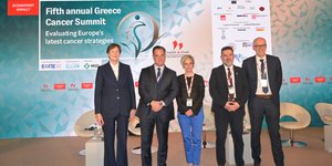 Ο Αδωνις Γεωργιάδης με τους συνομιλητές του στο συνέδριο του Economist