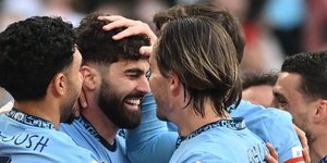 Παίκτες της Σίτι πανηγυρίζουν