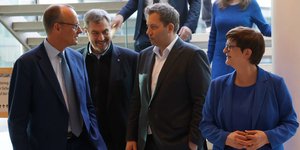 Φρίντριχ Μερτς, Μάρκους Ζέντερ, Λαρς Κλίνγκμπαϊλ και Σάσκια Έσκεν
