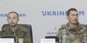 Οι δύο Κινέζοι αιχμάλωτοι, Ζανγκ Ρένμπο και Γουάνγκ Γκουαντζούν