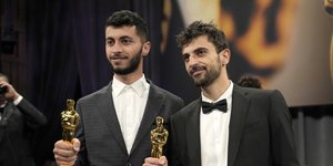 Ο Μπασέλ Αντρά αριστερά, με τον Γουβάλ Αμπραχαμ