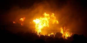 Wildfire Destroys Homes, Forces Mass Evacuations on Crete