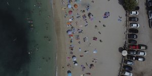 People gather at the beach