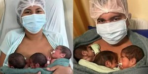 Οι γονείς ποζάρουν με τα τρίδυμα στην αγκαλιά τους