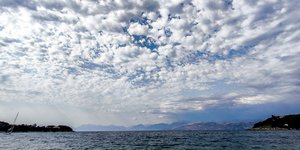 Clear skies with local showers and thunderstorms on Monday