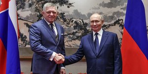 Ο Σλοβάκος πρωθυπουργός Ρ. Φίτσο με τον Ρώσο πρόεδρο Βλ. Πούτιν 