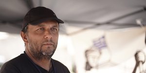 Πανος Ρούτσι  μαυρο καπελο