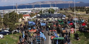 Greek farmers stormed runways and clashed with riot police on Crete