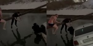 H στιγμή της διάσωσης του αγοριού από ταξί βυθιζόμενο σε κανάλι στο Νταγκεστάν