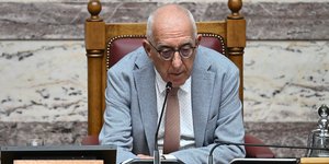 Νικήτας Κακλαμάνης, Νίκος Χούλης