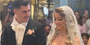 Φειδίας Παναγιώτου και Στυλιάνα Αβερκίου κατά την τελετή του γάμου τους