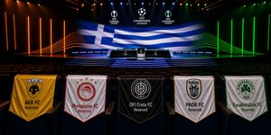 Η αίθουσα Grimaldi Forum του Μονακό και τα λάβαρα των πέντε ελληνικών ομάδων που θα μας εκπροσωπήσουν στα κύπελλα Ευρώπης