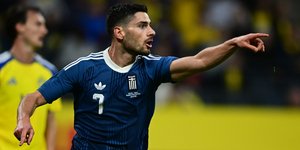 Ο Γιώργος Μασούρας πανηγυρίζει το γκολ του στο φιλικό Σουηδία - Ελλάδα / EUROKINISSI / KLODIAN LATO