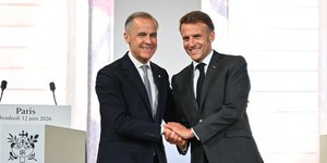 Μαρκ Κάρνεϊ και Εμανουέλ Μακρόν