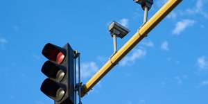 Traffic light and cameras on a pole