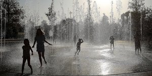 Children at a fountain