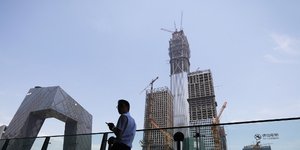 Για δωροδοκία καταδικάστηκε ο πρώην πρόεδρος της CDB (Φωτογραφία αρχείου: AP/ Andy Wong)