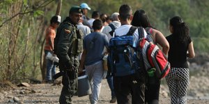 Κάποιοι εισήλθαν στην χώρα ένστολοι και άλλοι φορώντας πολιτικά (Φωτο: ΑΡ)
