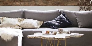 Σε ένα design καθιστικό/ Φωτογραφία: Anthropologie