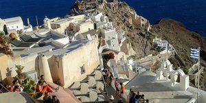 Ηλιοβασίλεμα στην Οία. Φωτογραφία: INTIME NEWS /ΒΟΛΙΤΑΚΗΣ ΣΤΕΛΙΟΣ