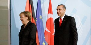 O Ταγίπ Ερντογάν και η Άνγκελα Μέρκελ/ Φωτογραφία αρχείου AP images
