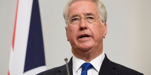 Φωτογραφία: (Leon Neal/Pool Photo via AP)