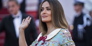Μαγείρισσα και μπέιμπι σίτερ έγινε η Χάγιεκ για χάρη του Ρέινολντς (Φωτογραφία: AP/ Arthur Mola )