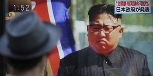 AP Photo/Eugene Hoshiko