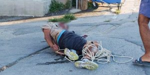 Ο επίδοξος ληστής δεμένος στο έδαφος