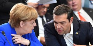 Ανγκελα Μέρκελ και Αλέξης Τσίπρας -Φωτογραφία αρχείου: AP Photo/Geert Vanden Wijngaert