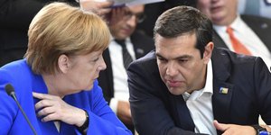 Ανγκελα Μέρκελ και Αλέξης Τσίπρας στις Βρυξέλλες /Φωτογραφία: AP