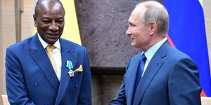 Ο Πούτιν με τον ομόλογο του από τη Γουινέα Αλφά Κοντέ (Φωτογραφία: Alexei Nikolsky